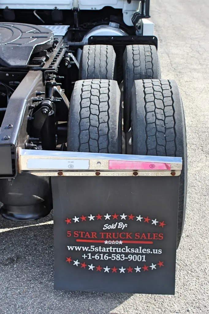 2019 Freightliner Cascadia 126 – rear drive tires and 5 Star Truck Sales mudflap.