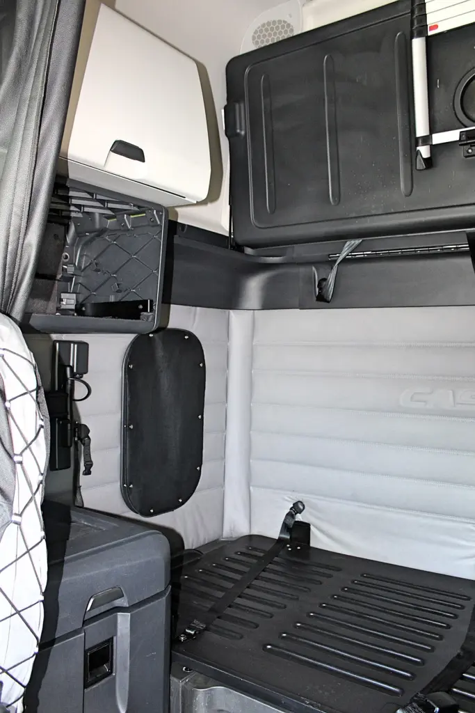 2019 Freightliner Cascadia 126 – sleeper interior with lower bunk, storage and mounting hardware.