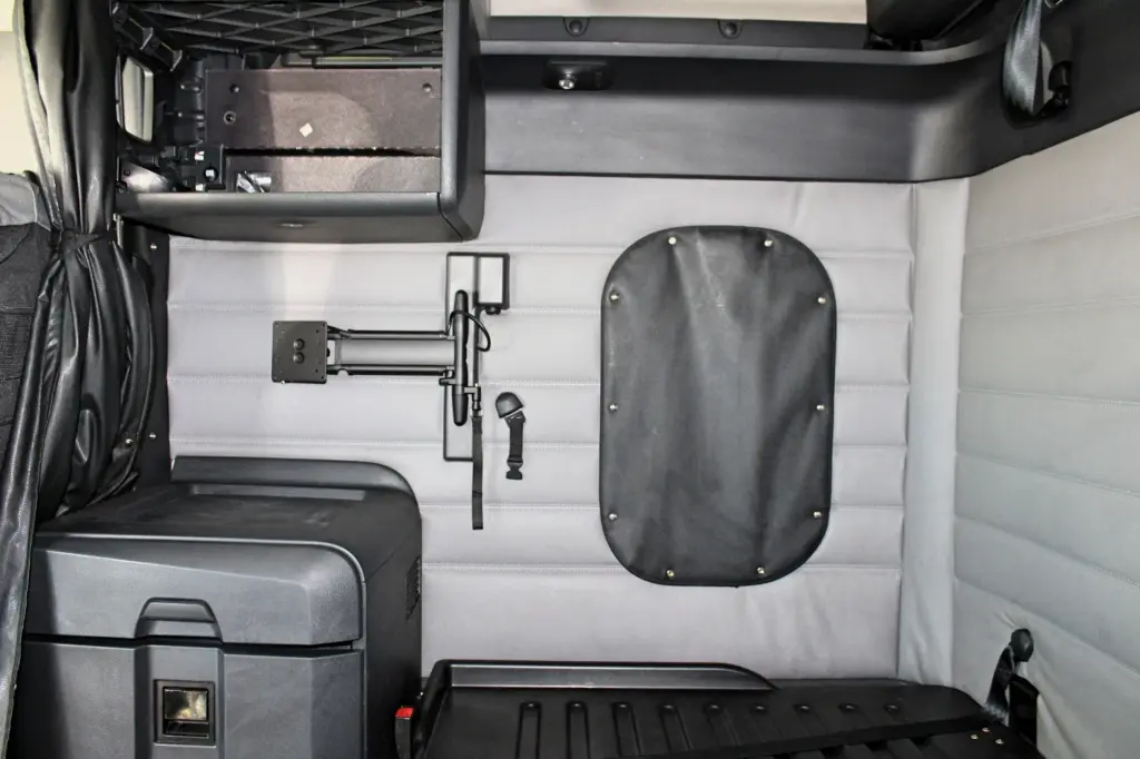 2019 Freightliner Cascadia 126 – sleeper interior with storage, bunk area and equipment mount.