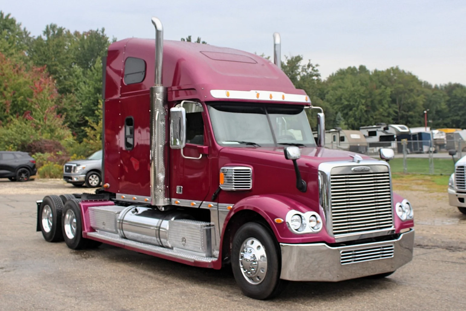 2020 Freightliner Coronado 132 Glider – burgundy sleeper semi truck front three-quarter view