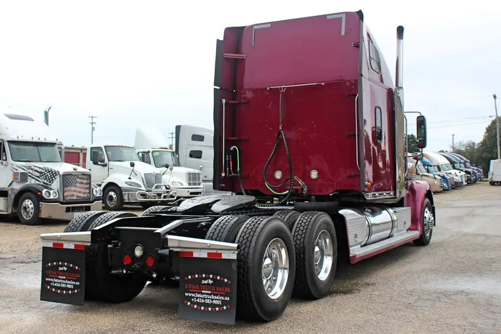2020 Freightliner Coronado 132 Glider – rear three-quarter view showing sleeper and tandem axles