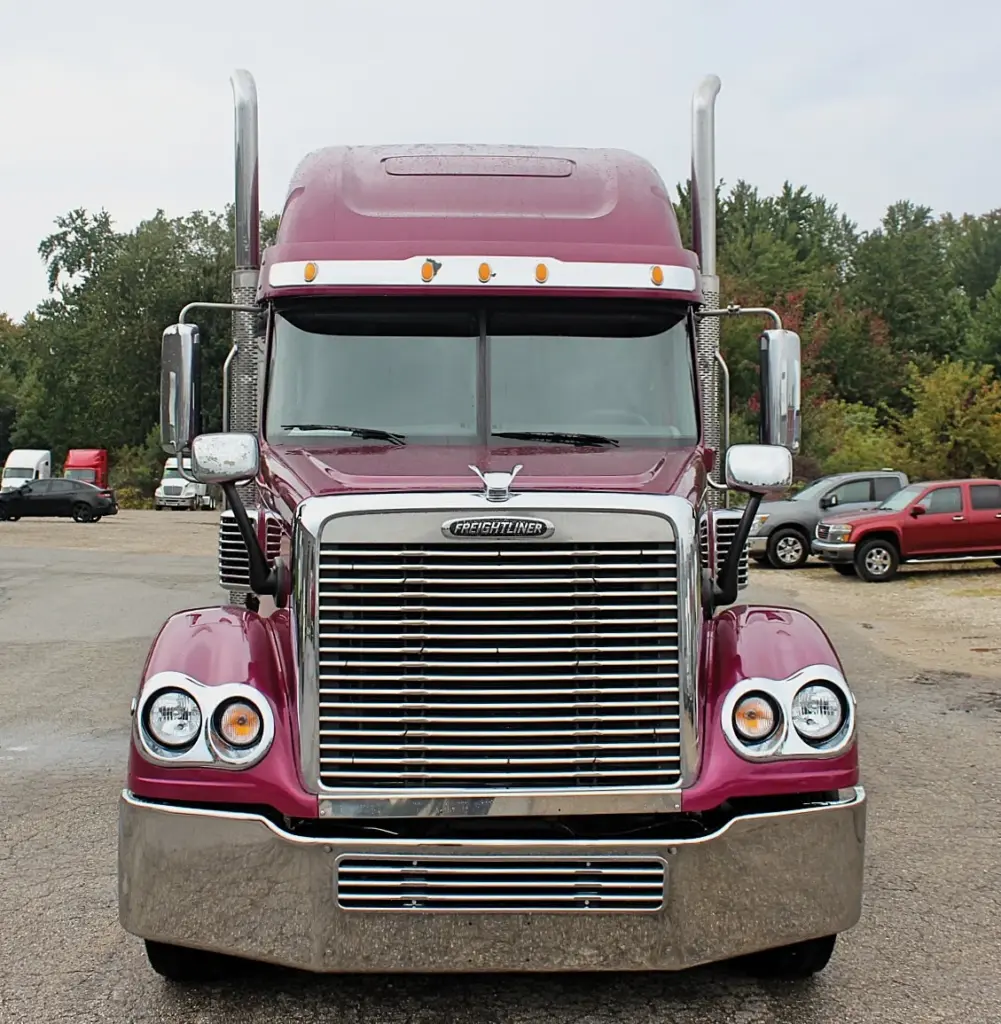 2020 Freightliner Coronado 132 Glider – straight front view with chrome grille and dual exhaust stacks
