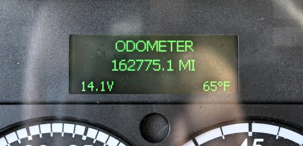 2020 Freightliner M2 106 — close-up of the digital odometer display reading 162775.1 miles with green text on dark screen