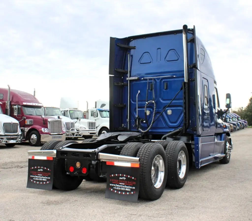 2020 Freightliner Cascadia 125 Glider – rear three-quarter view showing sleeper cab, tandem axles and fifth wheel.