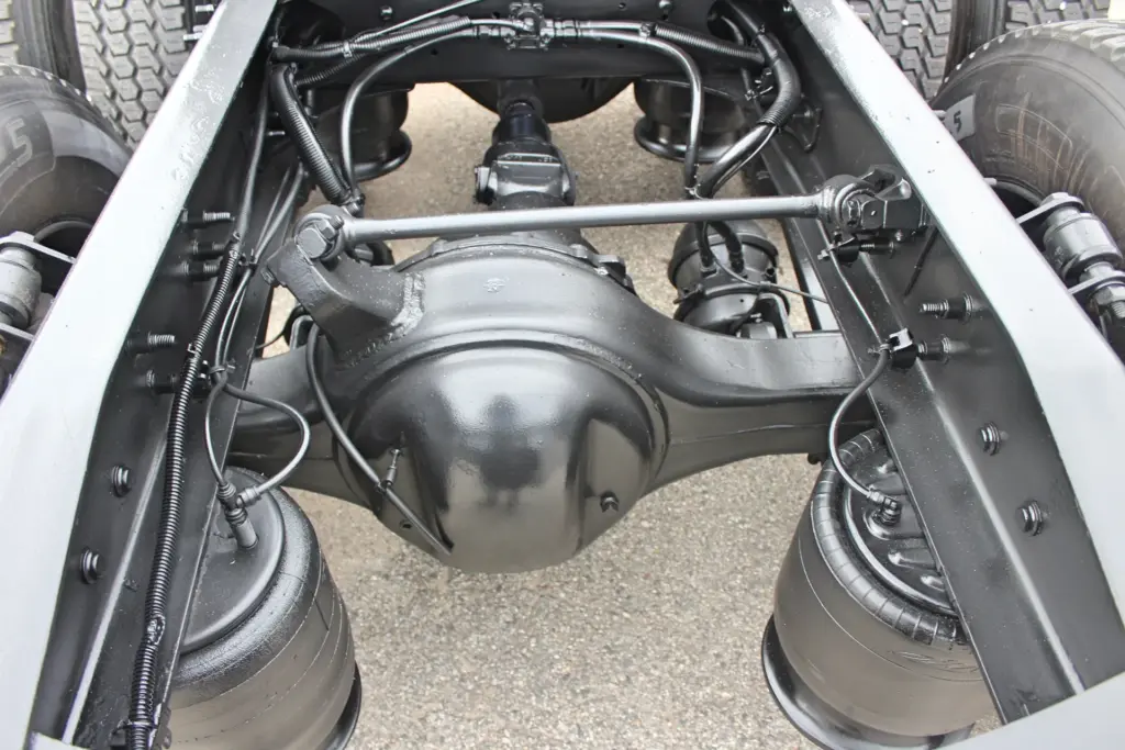 2020 Freightliner Cascadia 125 Glider – rear axle differential, suspension and frame components close-up.