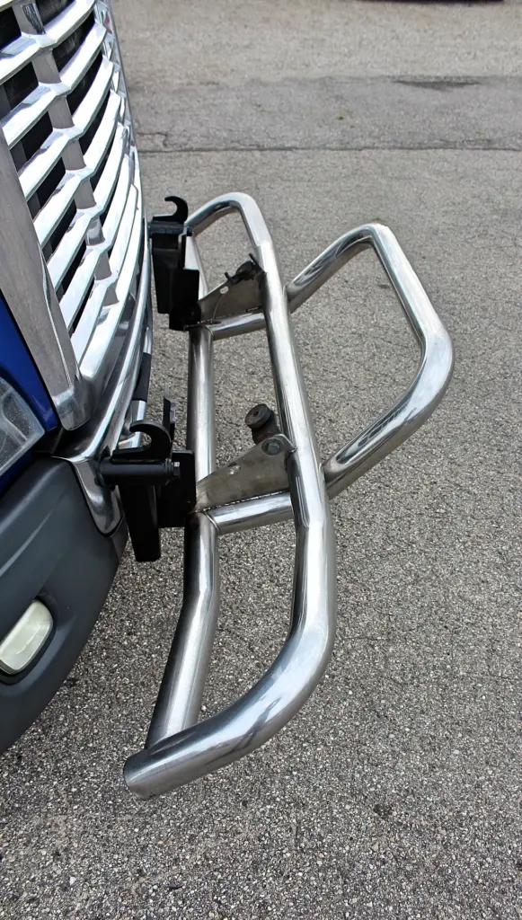 2020 Freightliner Cascadia 125 Glider – front grille guard and mounting brackets viewed from the side.