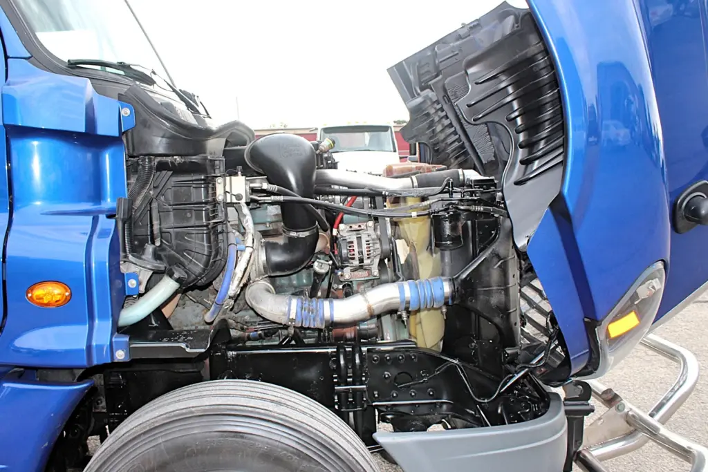 2020 Freightliner Cascadia 125 Glider – Detroit Series 60 engine compartment with hood open.