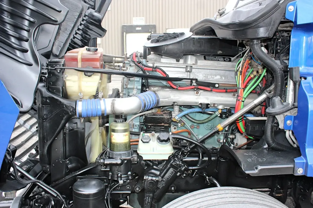 2020 Freightliner Cascadia 125 Glider – Detroit Series 60 diesel engine and engine bay components close-up.