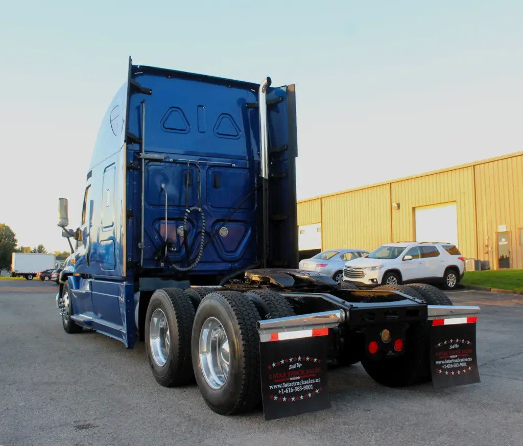 2020 Freightliner Cascadia 125 Glider – rear driver-side three-quarter view showing sleeper cab, tandem axles and fifth wheel.