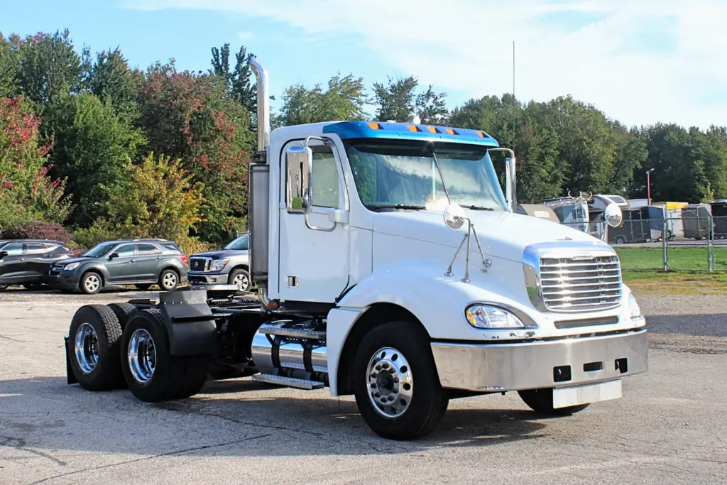 2020 Freightliner Columbia 120 Glider – white day cab semi truck front three-quarter view
