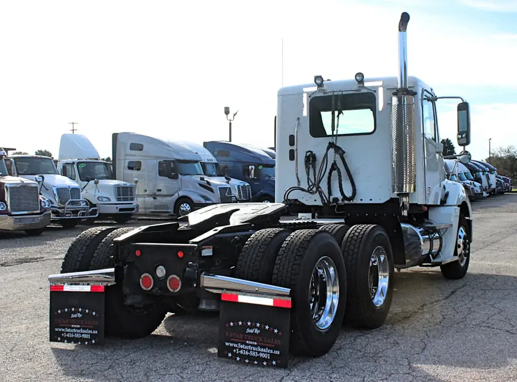 2020 Freightliner Columbia 120 Glider – rear three-quarter view of day cab tractor