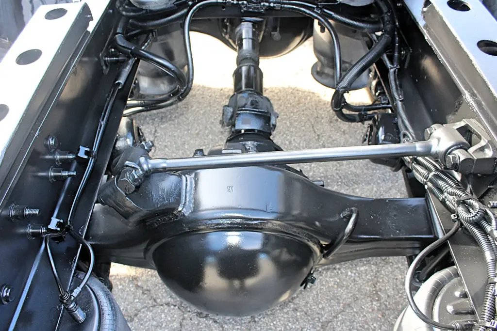 2020 Freightliner Columbia 120 Glider – close-up of rear axle differential and suspension