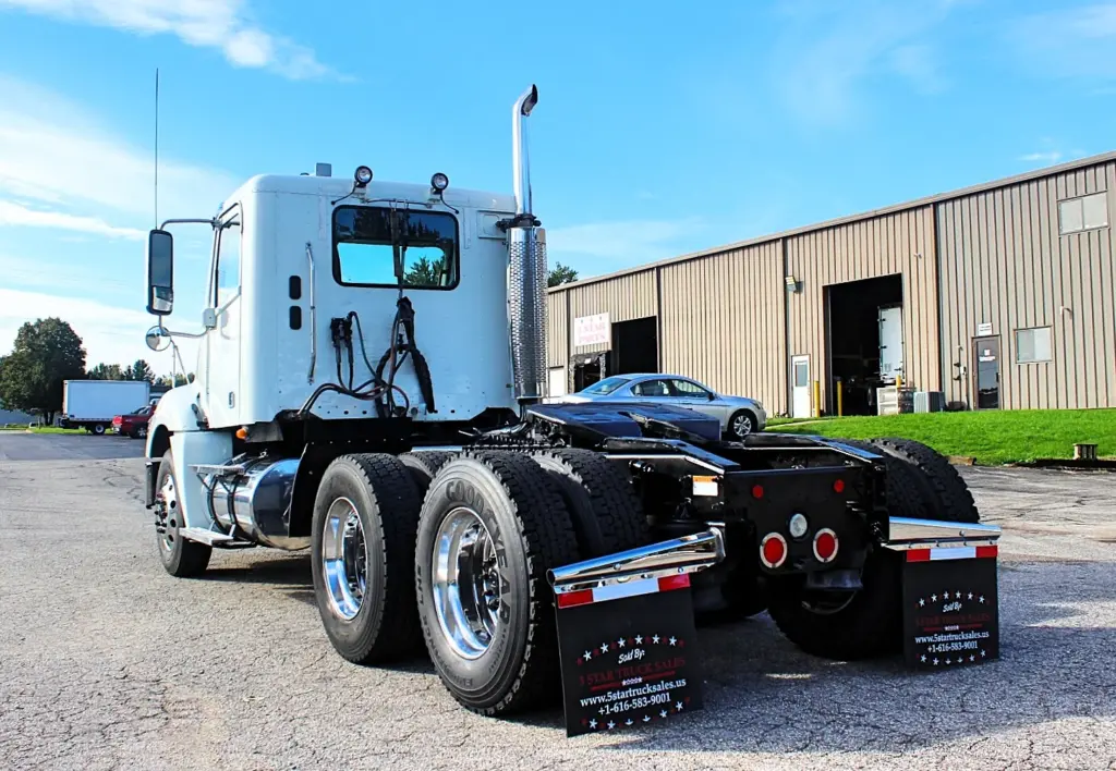 2020 Freightliner Columbia 120 Glider – straight rear view with tandem axles and fifth wheel