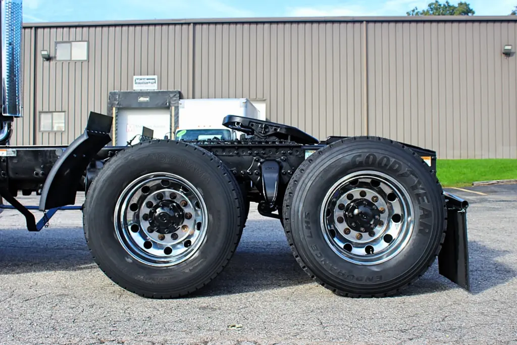 2020 Freightliner Columbia 120 Glider – driver-side rear three-quarter view of white tractor