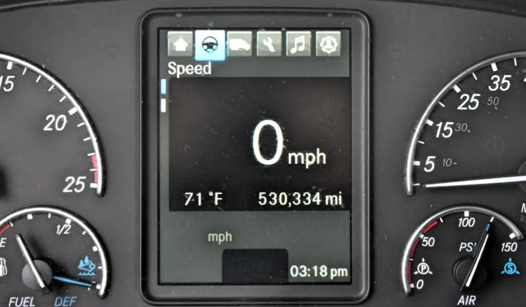 2021 Freightliner Cascadia 126 — close view of digital speed display reading 0 mph with 530,334 mi odometer below