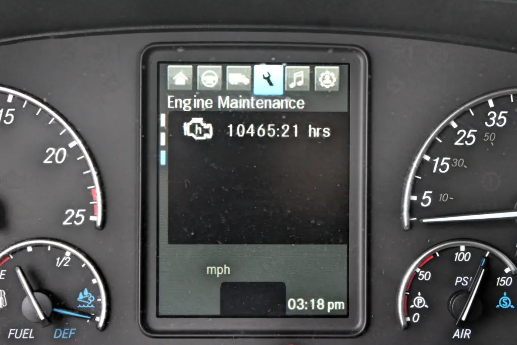 2021 Freightliner Cascadia 126 — close view of dash screen on engine maintenance page showing 10465:21 hrs